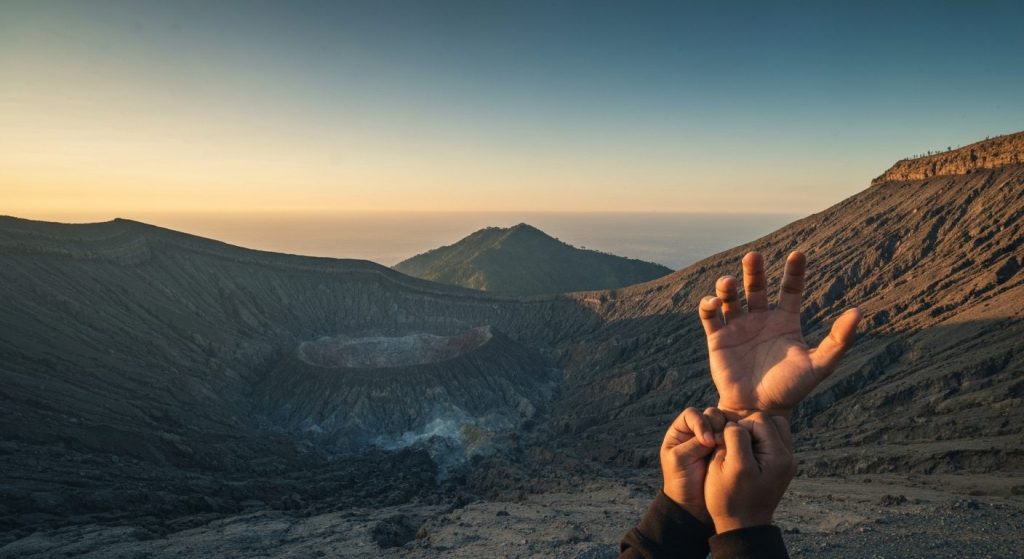 cheapest way to see ijen blue fire from bali — Photorealistic editorial travel photograph relevant to: The honest, exper